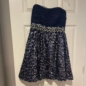 Dress for homecoming. Worn once. Great used condition. Navy blue and silver